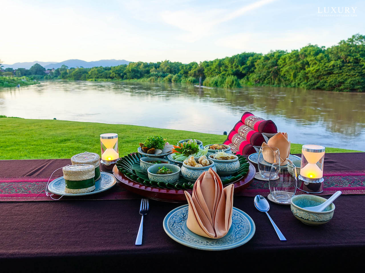 Chiang Rai’s Riverside Scene – The Blossom by the Riverie